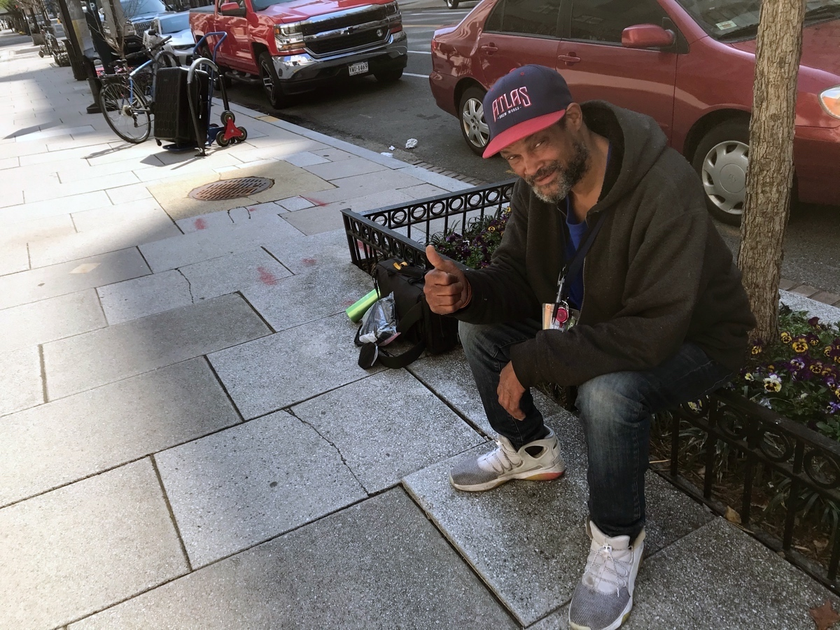 Sometimes, Carlton Johnson reads his poetry to his customers when he's selling the Street Sense newspaper in Washington, D.C.