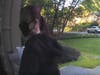 Arlington County Police released surveillance photos of the woman they say passed a bad check to buy a used car from a local resident. The woman had multiple ear piercings in her left ear and long purple/red hair.