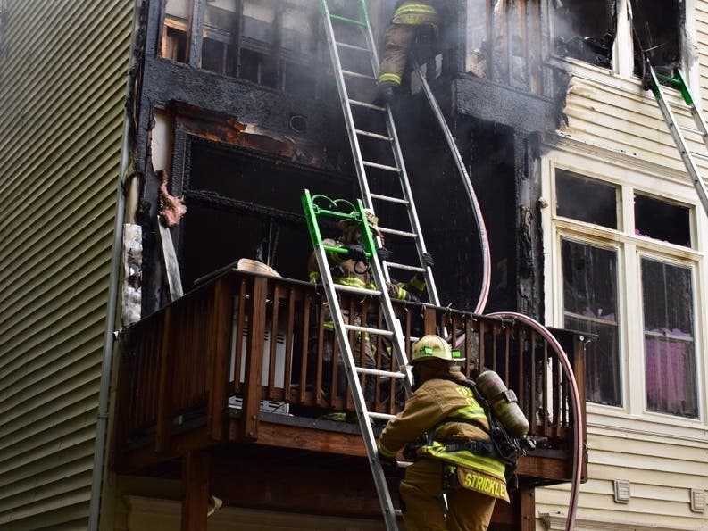 A two-alarm blaze brought fire units from both the City of Fairfax and Fairfax County to a townhouse in the Fair Lakes area Sunday morning.