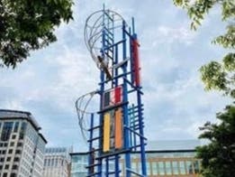 A celebration of Buoyant Force, a 50-foot steel sculpture by artist Sue Wrbican, is planned for Friday at Reston Town Square Park.
