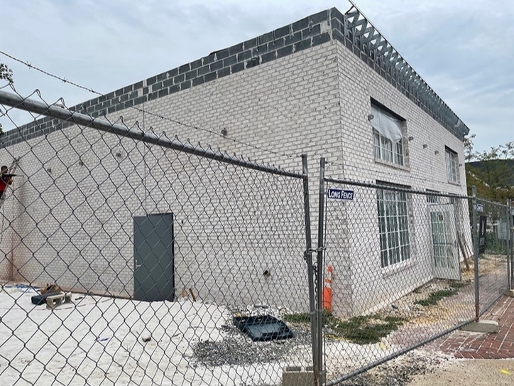 Two painted murals are being considered for the south-side wall of Draper's Restaurant, which is currently under construction in Old Town. This is the service side of the building and can be viewed from Main Street near the Old Lee Highway intersection.