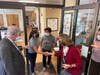 U.S. Sen. Tim Kaine (Virginia) and Virginia First Lady Pamela Northam shake hands Friday with two of the employees at Main Street Child Development Center​​ in Fairfax City.
