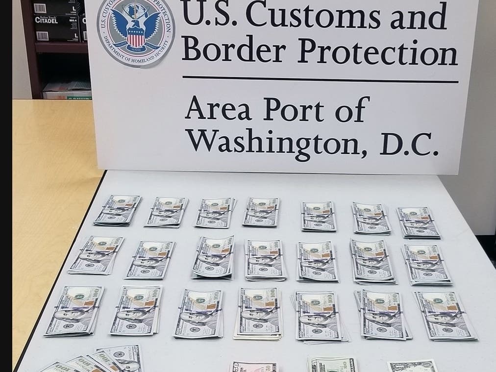 Customs and Border Protection officers seized $23,641 in unreported currency from a Ghana-bound couple at Washington Dulles International Airport on Nov. 22.