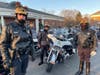 Three Santa Ride motor officers are appropriately dressed with antlers on their heads on Tuesday morning in Fairfax.
