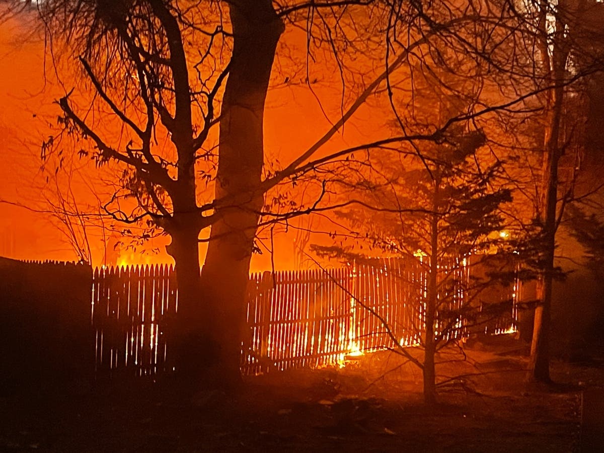 The patio areas of two of the townhouses on Nonquitt Drive were engulfed in flames as Fairfax County Fire & Rescue units arrived on the scene shortly after 5 p.m.