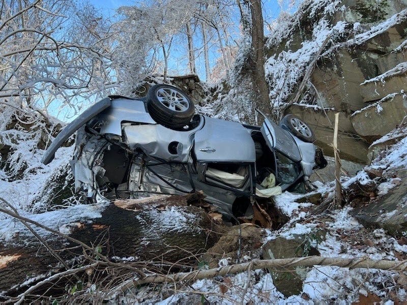 On Tuesday, D.C. rescue personnel visited the scene of Monday night's crash on the George Washington Parkway to retrieve equipment and assess the stability of the vehicle.
