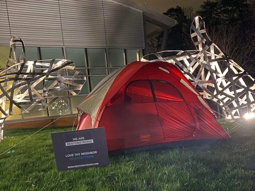 Reston Strong sets up tents outside Hunter Mill supervisor's office Monday night to advocate for temporary housing for the homeless.