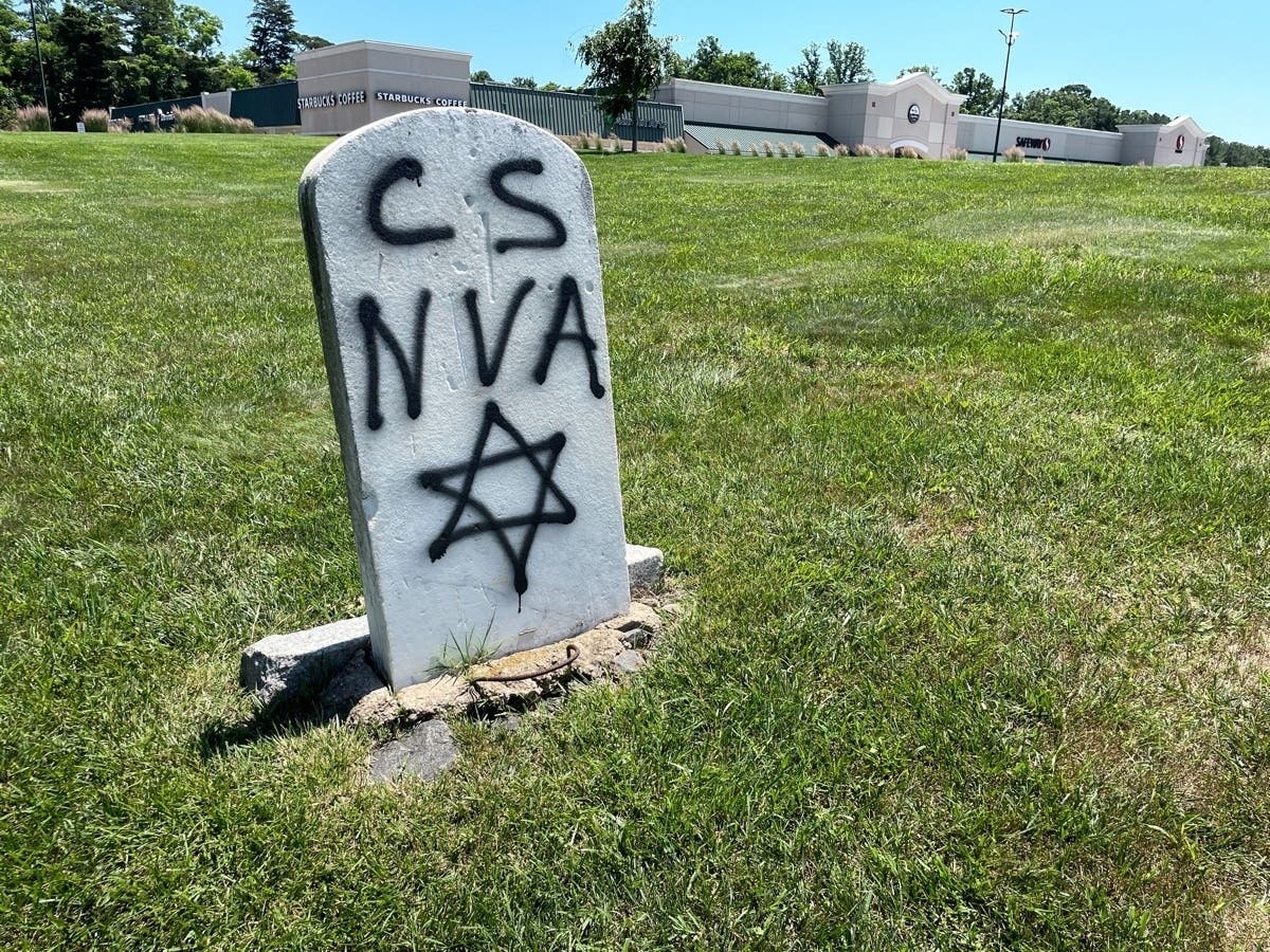 The tombstone of Armistead T. Thompson, who fought for the Confederacy in the Civil War, was spray-painted with a Star of David and other markings.