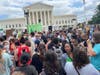 A large crowd of abortion rights advocates gathers in front of the Supreme Court Building in Washington, D.C., to protest the decision to strike down Roe V. Wade, the 1973 decision that made abortions legal in the U.S.