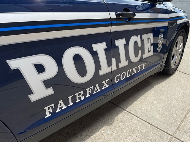 A cellphone video shows two Fairfax County police officers pointing firearms at a person who is filming other officers detaining someone. 