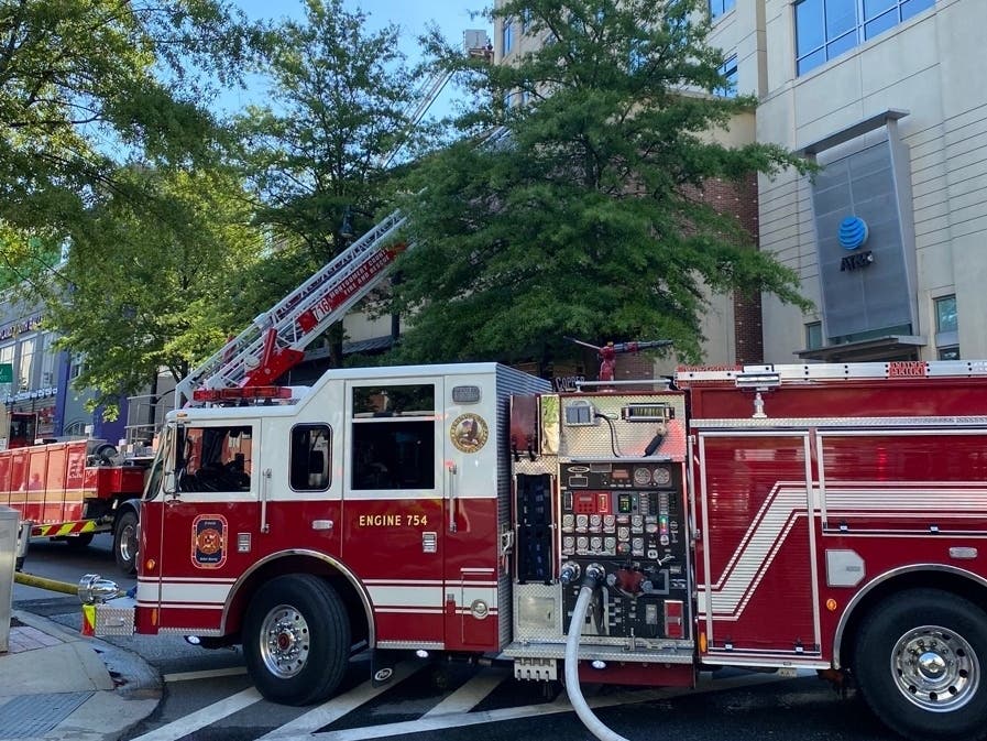 Firefighters continued to chase hot spots as they wrapped up their response to a two-alarm kitchen fire at a Silver Spring restaurant.