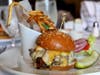 Davio’s Steakhouse Burger, with Vermont cheddar, bacon, and herb aioli, is available off the menu in the restaurant's vast 32-seat bar.