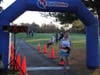 Joe Lorusso crosses the finish line first in Saturday's Turkey Trot 2022 hosted by the Herndon Parks and Recreation.
