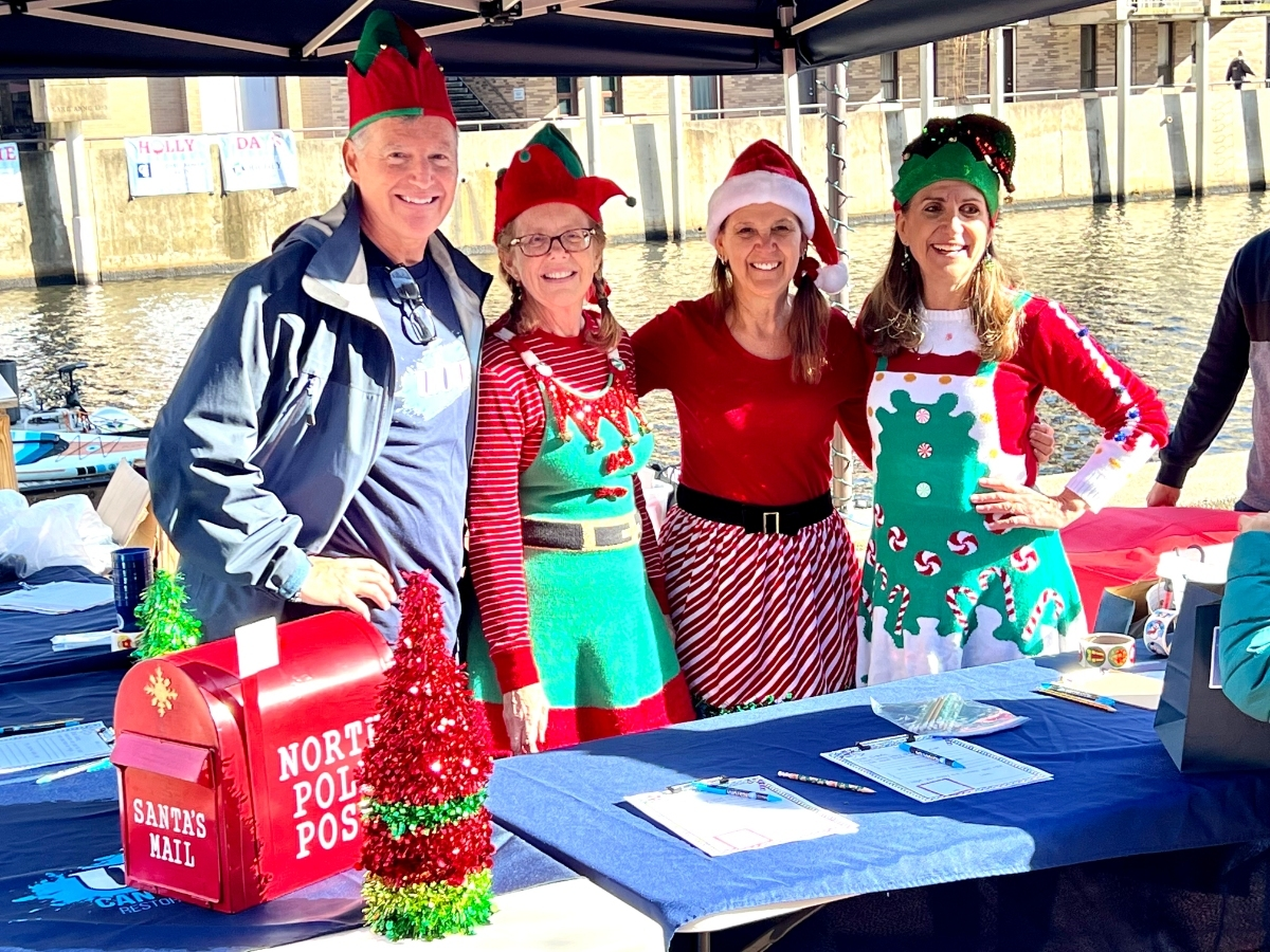 Holiday Season Arrives With Santa Aboard Lake Anne Pontoon Boat