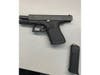 While being chased by Montgomery County Police officers, Kevin Smith hid a black fanny pack containing this 9mm Glock handgun under a vehicle in the parking lot of the Sport Chevrolet dealership in the 3000 block of Automobile Boulevard, police said.