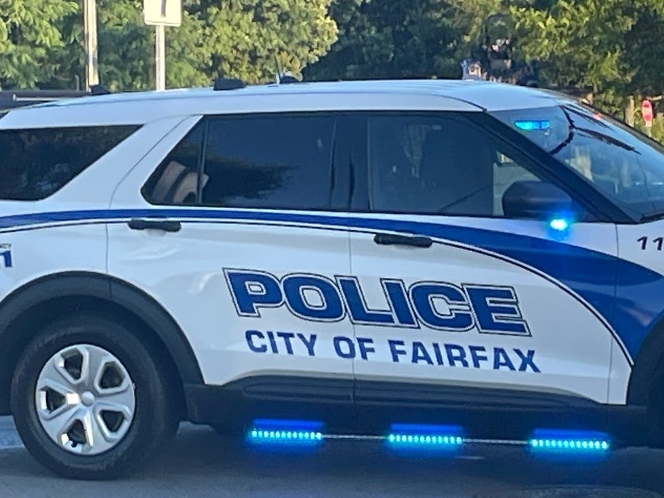 City of Fairfax Police confirmed that a man's body was found inside a portable toilet behind a paint store on Lee Highway early Saturday.