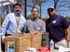 The Virginian team, from left, Bryan Lamartin, independent living and assisted living administrator; Michael San Juan, head of community outreach and Kevin Rios, sales counselor welcome attendees.