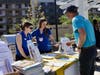 From left, Virginian Rehabilitation and Wellness Occupational Therapist Emily Parrell and Physical Therapist Susan Geiger share information with a participant.