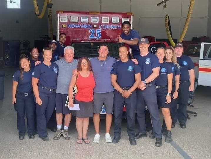 A woman who had a seizure and went into cardiac arrest outside a fire station recently met the emergency workers who saved her life.