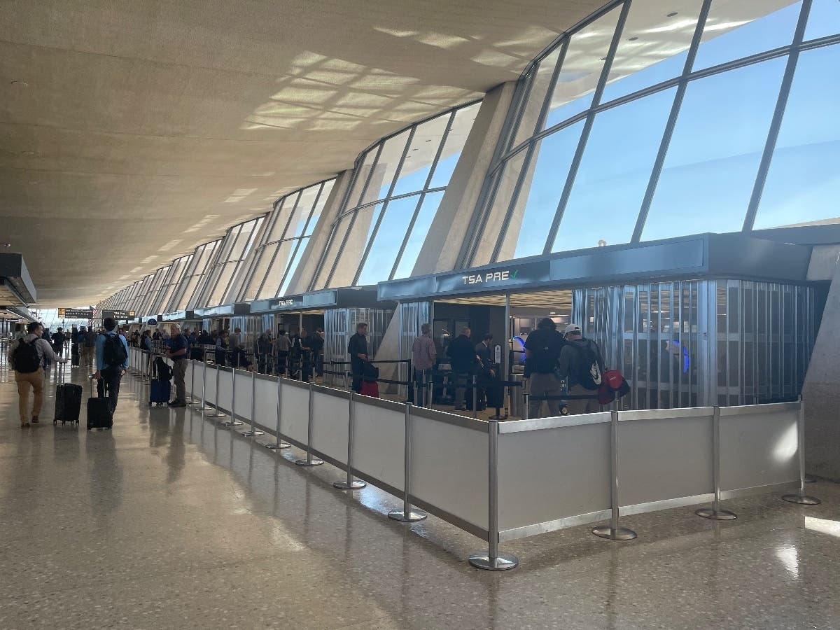 Two men wanted in Maryland for rape were arrested by customs officers at Dulles Airport in Virginia as they were waiting to board two separate flights to El Salvador.