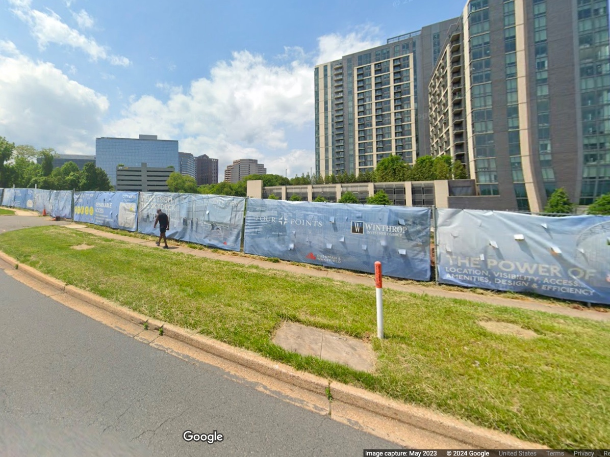 A developer wants to build a 28-story hotel with luxury condos and ground-floor retail instead of an already approved office building at Arbor Row in Tysons, according to reports.