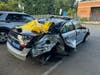 Virginia State Police arrested a 35-year-old Arlington woman in connection with Tuesday morning's crash on the Capital Beltway that injured a state trooper.