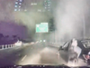 Trooper Aziz rises to her feet after being struck by a sedan early Tuesday morning on in the travel lane of Capital Beltway/I-495. Later, she was taken to Inova Fairfax Hospital to be treated for minor injuries.