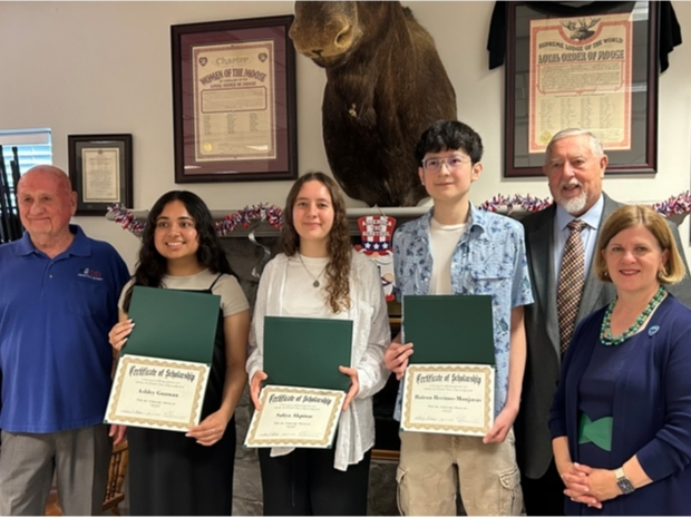 Attending Saturday's ceremony are (From Left) Scholarship Chair Bill Stollhans; scholarship recipients Ashley Guzman, Safiya Akpinar and Bairon Recinos-Monjaras; Moose Lodge President Herb Zimmerman and Fairfax City Mayor Catherine Read