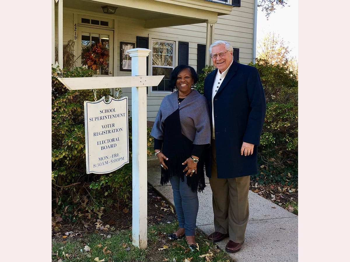 Dr. Phyllis Pajardo, who was superintendent from 2017-2022, and George Stepp outside the City Schools office.