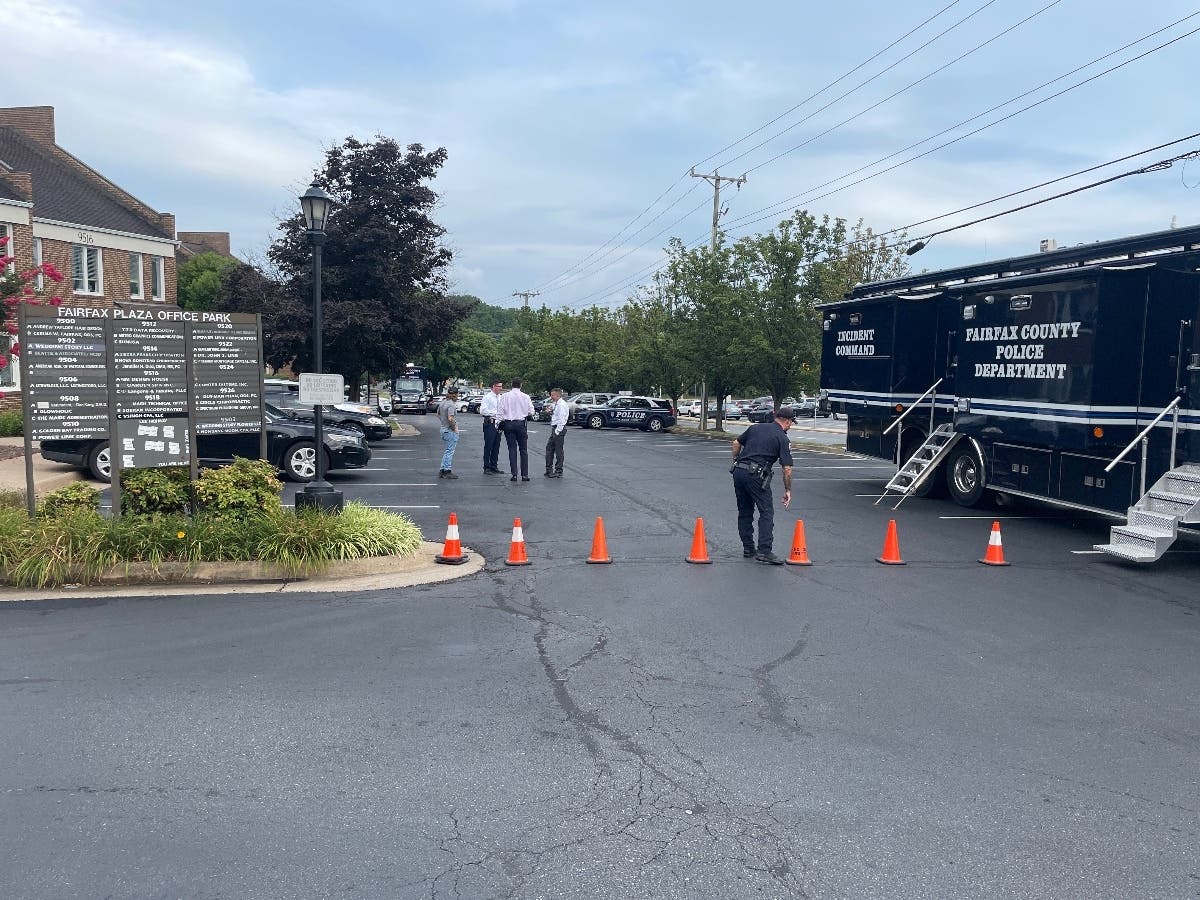 Detectives with the Major Crimes Unit of the Fairfax County Police Department begin their investigation into the death of a man whose body was found Saturday near the Cross County Trail off of Route 29 east of Fairfax Circle.