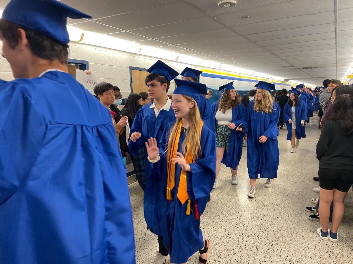 Graduating seniors from Fairfax High School visit Katherine Johnson Middle School on June 5, 2023 as part of the City of Fairfax School's annual Graduation Walk.