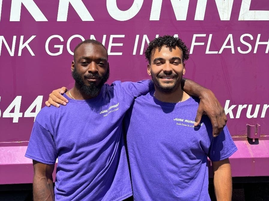 George Mason University graduates Jeremiah Hankerson (Left) and Jacob Weigel are owners of Junk Runners, a Fairfax-based junk removal company.