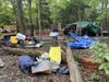 Cleanup crews with the Fairfax County Park Authority began clearing a large homeless encampment at Mantua Park on Wednesday morning.