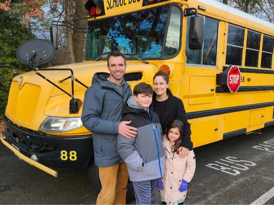 Tom Dannan, seen here posing for a photo with his family, seeking the Democratic Party's endorsement in Saturday's firehouse primary in the Braddock District school board race. 
