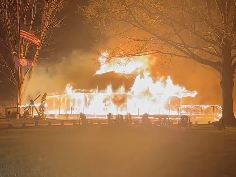 When Fairfax County Fire and Rescue units arrived at the Lorton Yacht Club, the boathouse was engulfed in flames and flames had spread to the surrounding brush.