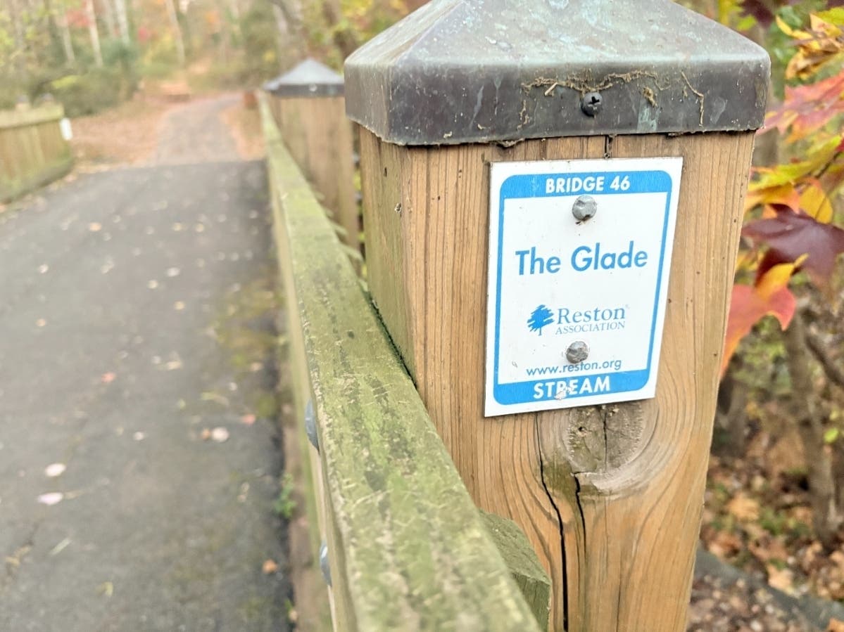 A post marks The Glade Trail, which runs through one of Reston's many green spaces.
