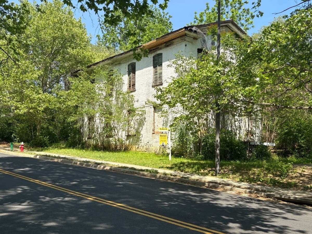 Reston Associates LLC plans to redevelop 1850 Old Reston Ave. The plan includes up to 57 townhomes and the preservation of the A. Smith Bowman House, built around 1899.