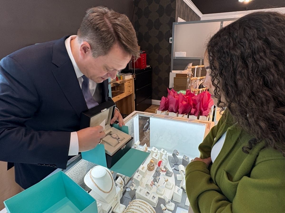 T.J. Shea, owner of Fairfax Fine Jewelry, shows an antique watch he recently purchased. All second-hand items Shea purchases are reviewed by the City of Fairfax Police to ensure that they have not been reported stolen.