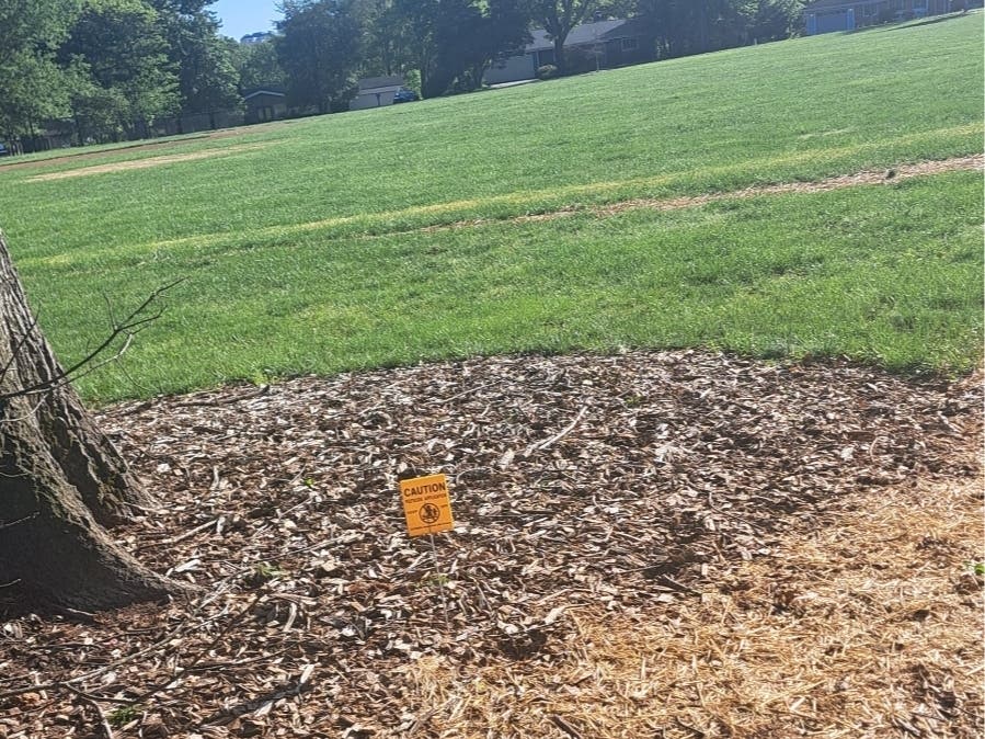 Reston Association will use larger signs and create a webpage after Waterford Square resident Amy Becker raised safety concerns about the size of the signs placed around the newly renovated Hook Road Recreation Area.