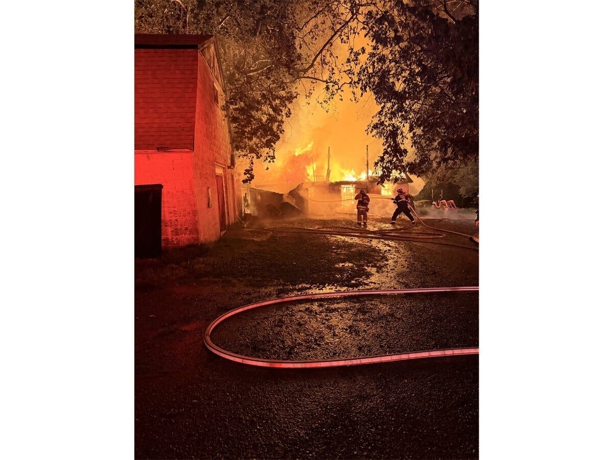 Fairfax County firefighters tackled a well-involved barn fire on Walker Road late Wednesday night using tanker shuttle operations.