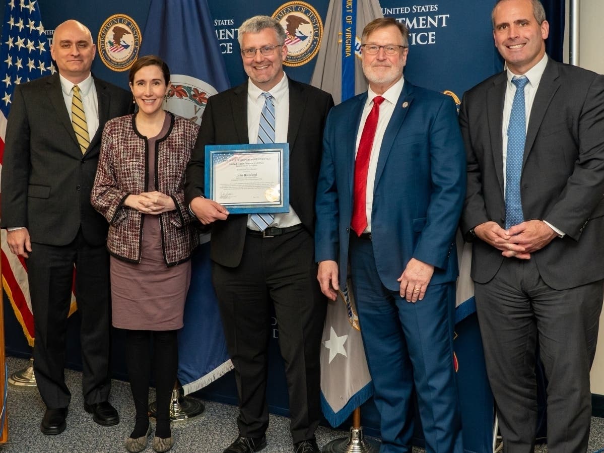 Arlington Detective John Bamford was recognized for cybercrime work tied to child exploitation investigations.