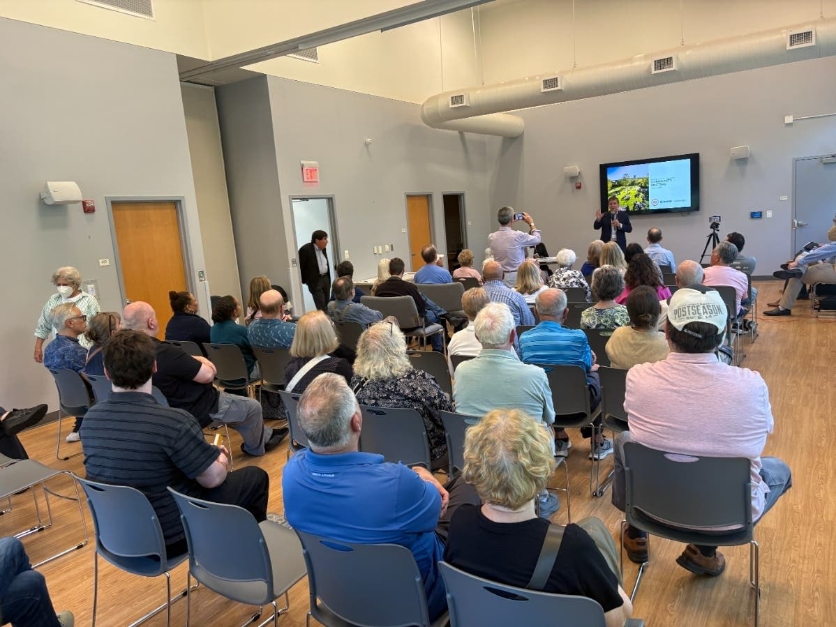 Nearly every seat was taken at Tuesday night's town hall on the Reston Town Center North project. On July 22, the Fairfax County Planning Commission is hosting a public hearing to review the project's rezoning application.
