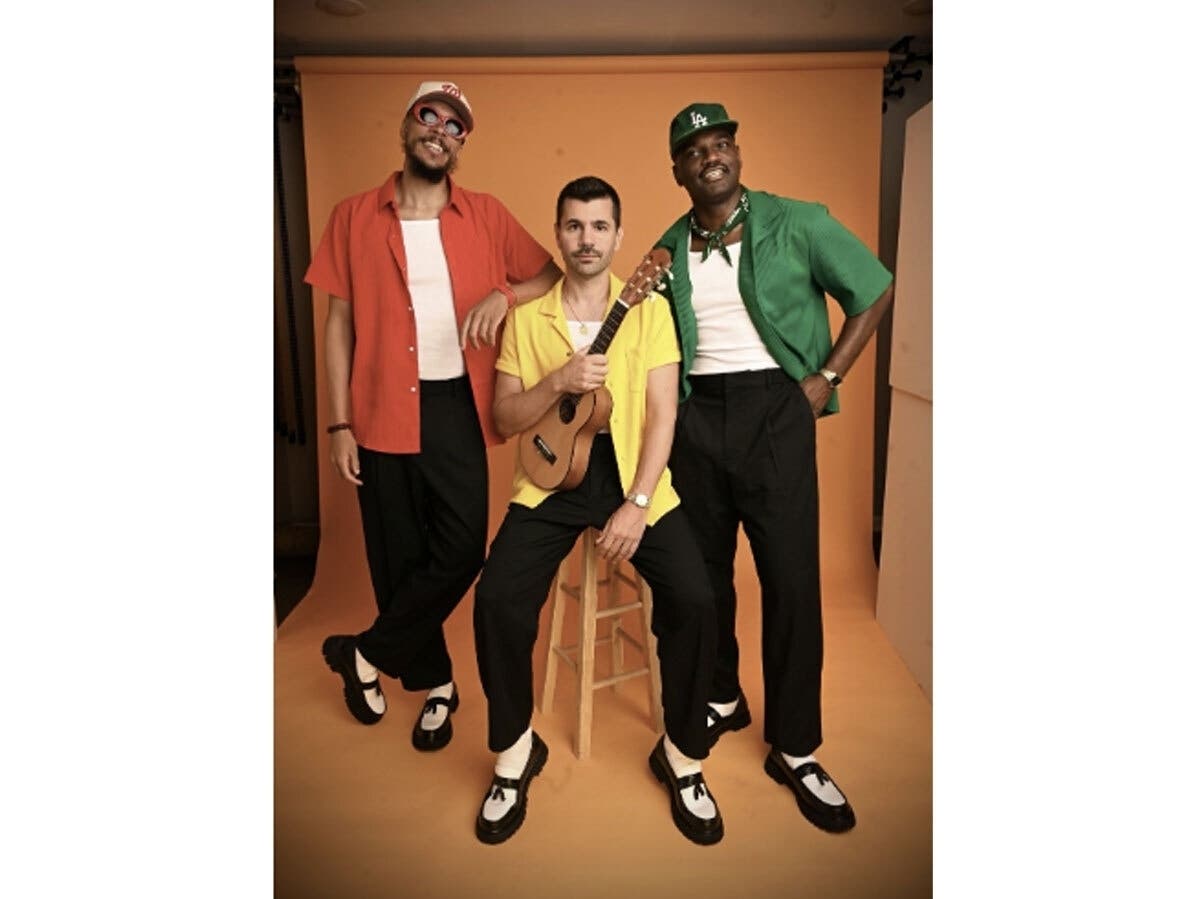 Band members Marcus “Red” Parham, Andrei “Gold” Busuioceanu, and Pierre “Green” Desrosiers return to Reston for a hometown concert Saturday, June 27, at Reston Town Center.
