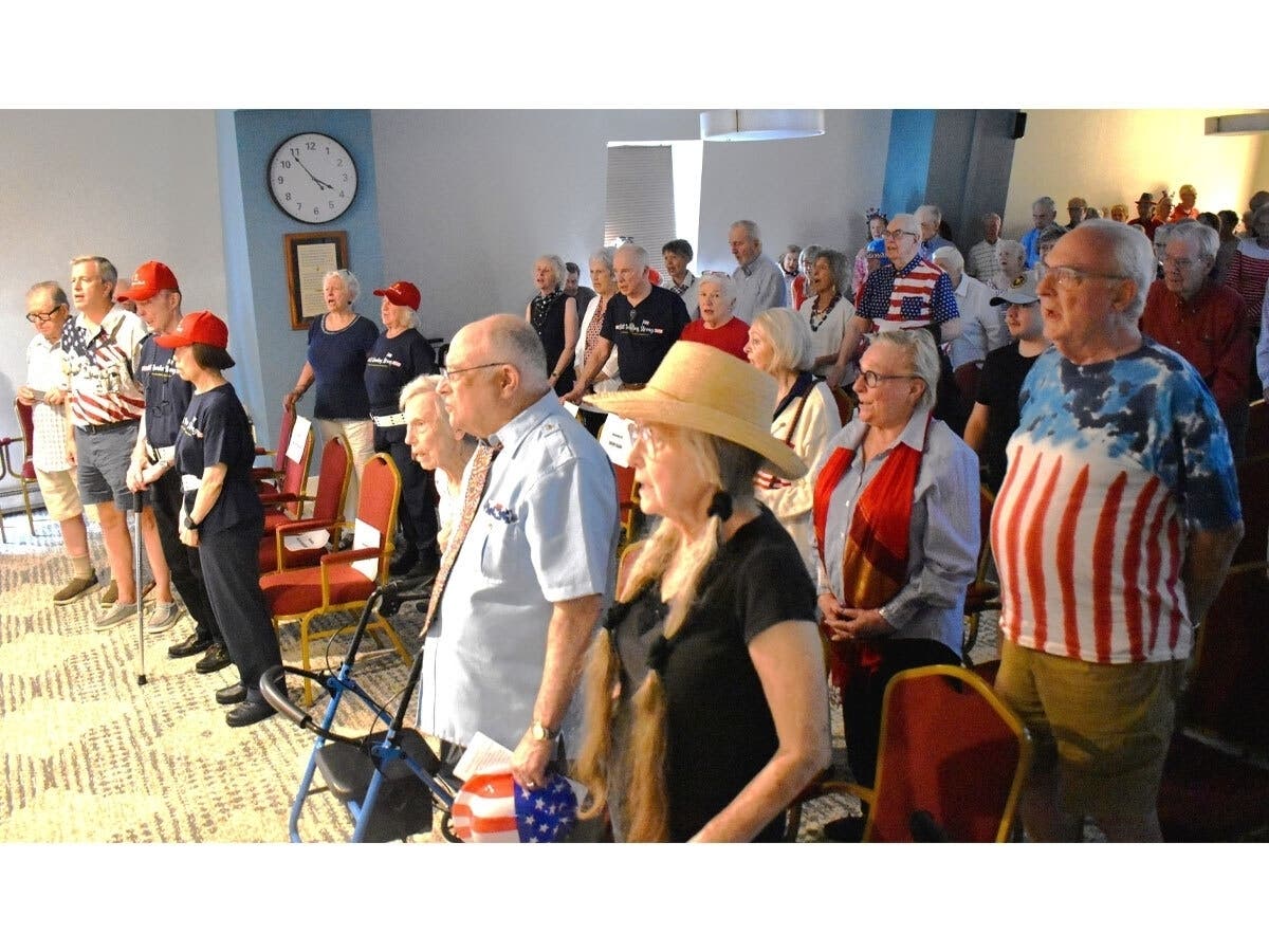 Vinson Hall residents in McLean marked America's 250th birthday with a flag ceremony, Declaration reading and patriotic celebration.