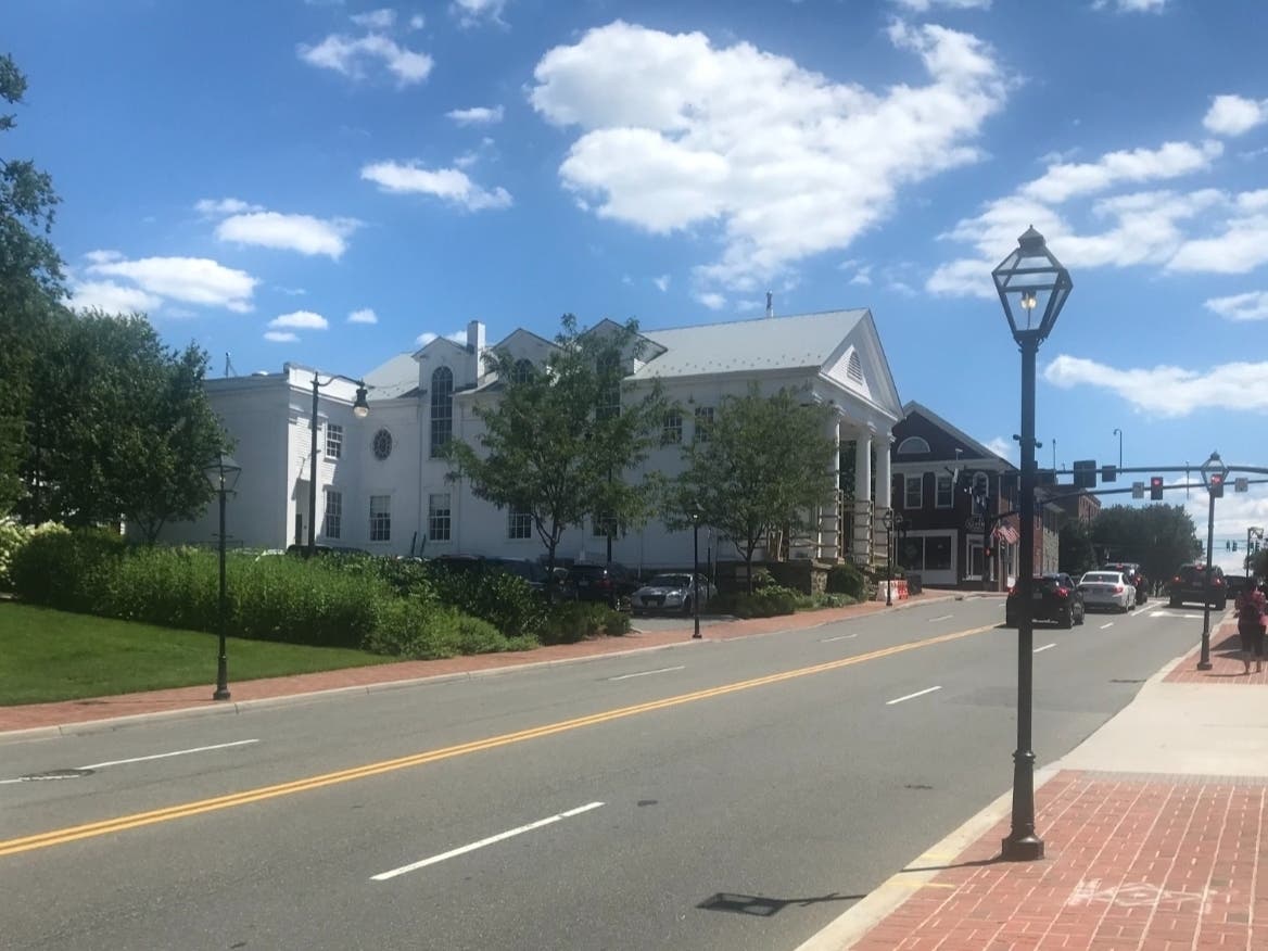 Fairfax City weighs new activity-center zoning rules as council members debate density, height, parking and public benefits.