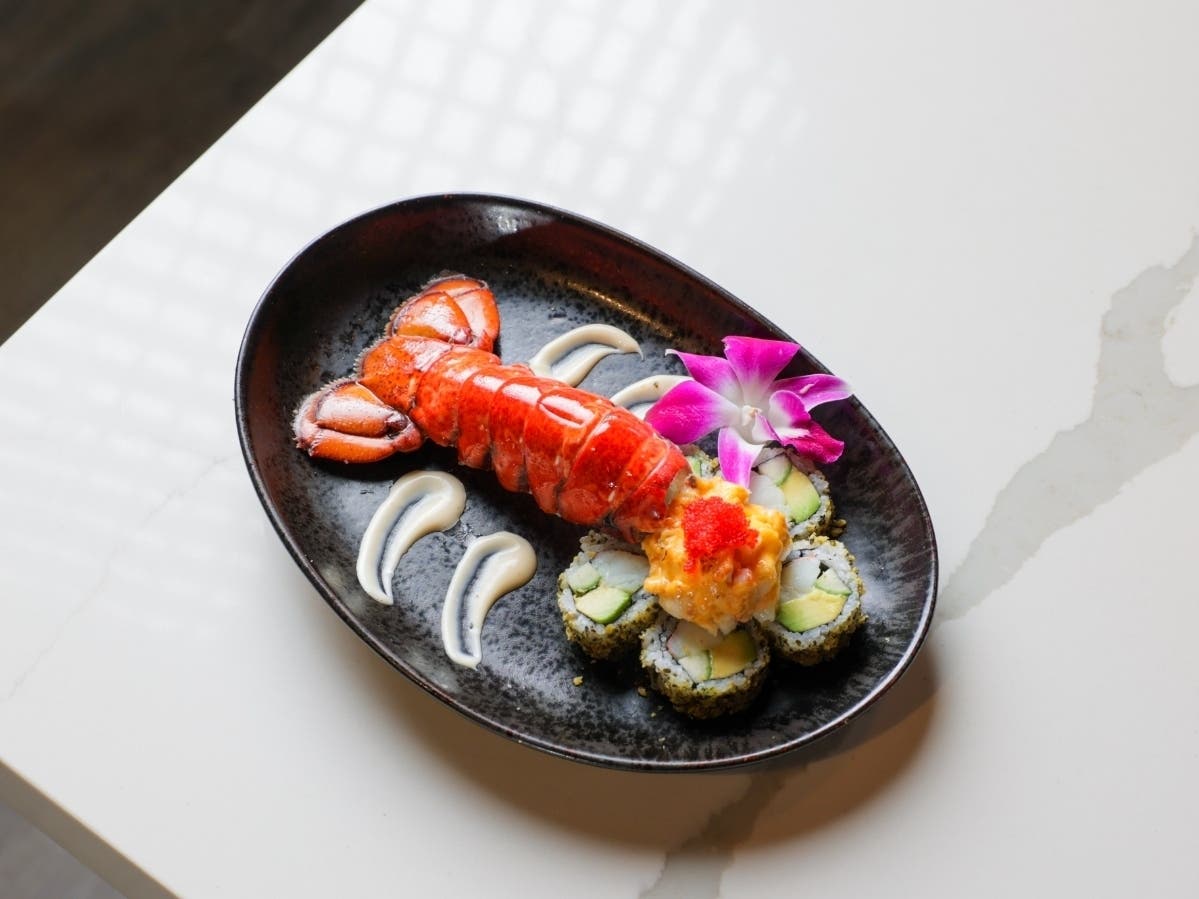 As part of its DC Restaurant Week promotion, Yume Sushi in Arlington is offering a Lobster Volcano Roll, freshly steamed lobster tail, avocado, smoked trout roe, spicy mayo, creamy tataki sauce.