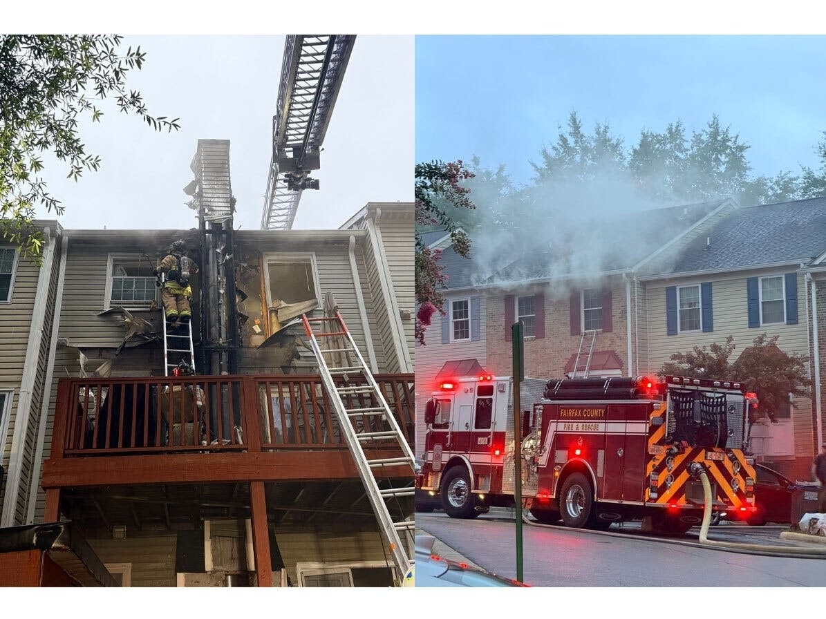 Fairfax County firefighters responded to a townhouse fire Wednesday morning in Lorton. All occupants escaped safely.
