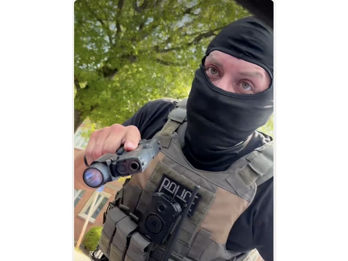 Carolina Molina, a licensed professional counselor and Northern Virginia resident, recorded ICE agents approaching her vehicle Aug. 10. One of the masked agents pointed his weapon at her.
