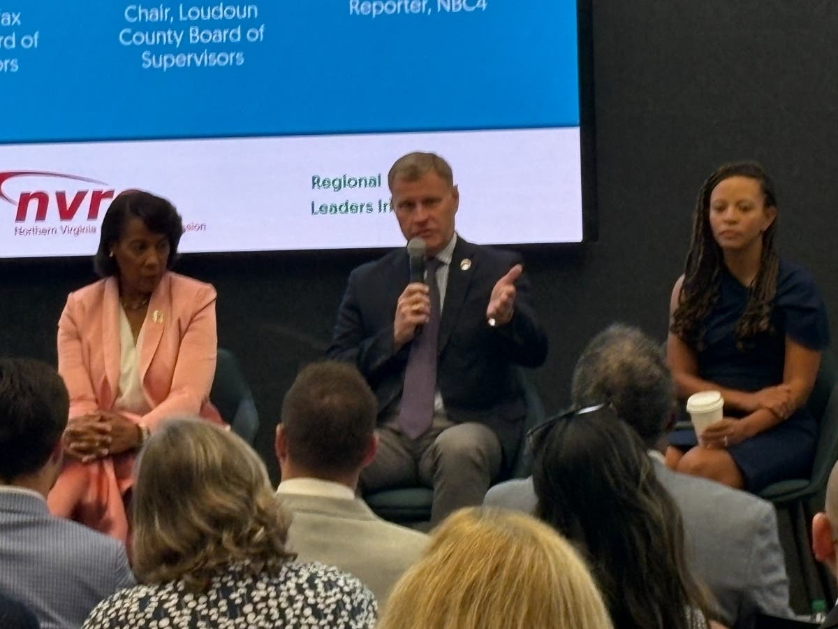 When immigrant residents become afraid to interact with law enforcement, crimes become harder to solve, said Fairfax County Board Chair Jeff McKay, center, during Wednesday's 11th Annual Northern Virginia Regional Elected Leaders Summit in Arlington.