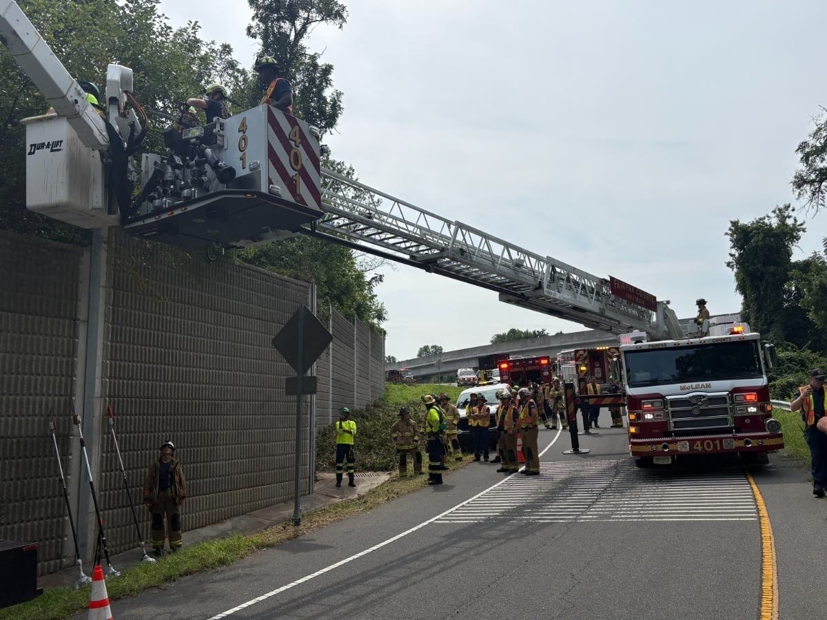 Firefighters rescued a worker stranded 20 feet above a Route 267 ramp in a disabled bucket truck in McLean.